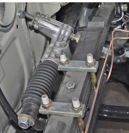 Picture: Mounted sealing (gaiter) Steering rack for example at one of our customers restoring cars.<br>The picture only dispaly the mounting position. All other parts except the Steering rack gaiter itself are not part of this offer! 